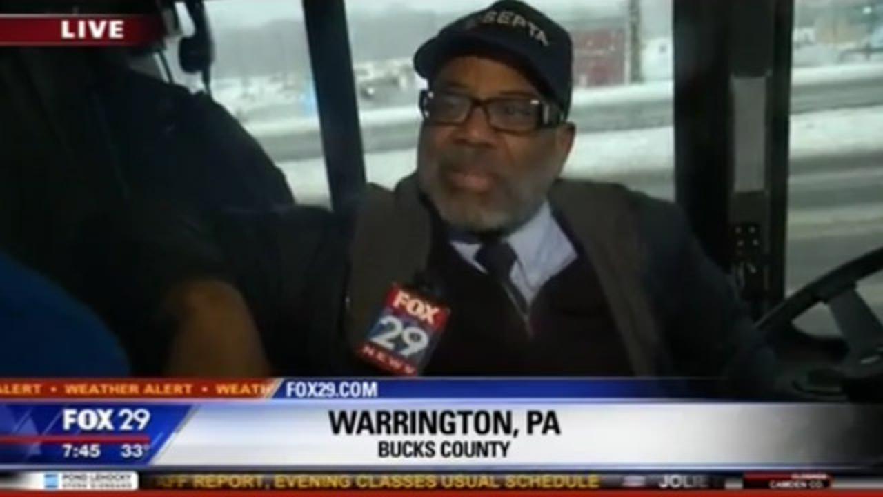 Bus Driver Loses Mind During Live Interview When People Try To Sneak Onto Bus