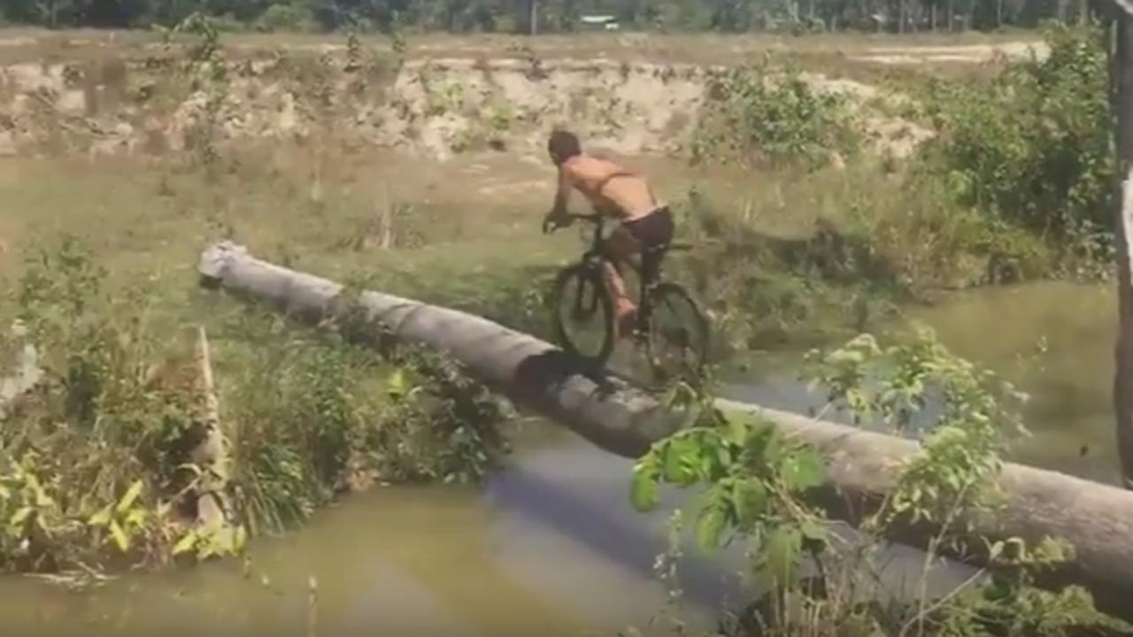 Bicyclist Falls While Crossing River On A Log And Now He Can'T Hav_...
