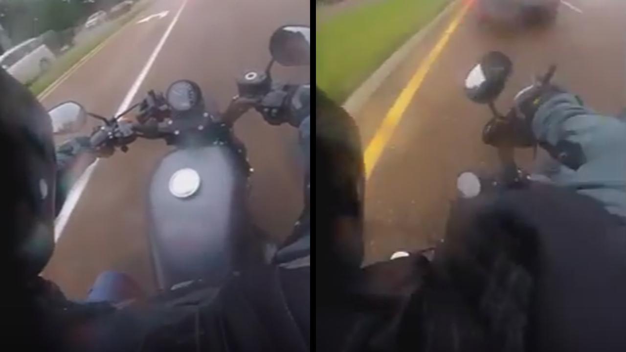 Whoops! Biker Slams The Brakes And Goes Sliding On Slick Road
