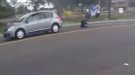 Biker Takes A Wicked Crash Into Versa
