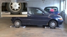 Check Out These Cool, Car-Lifting Robots
