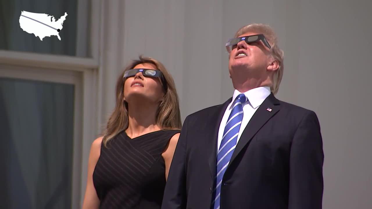 Trump Watches The Solar Eclipse