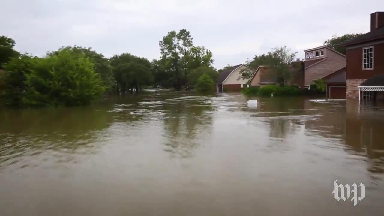 Head-On Shot Of Boat Through Neighborhood
